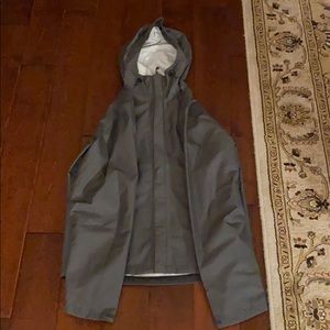 This is a gray north face windbreaker
